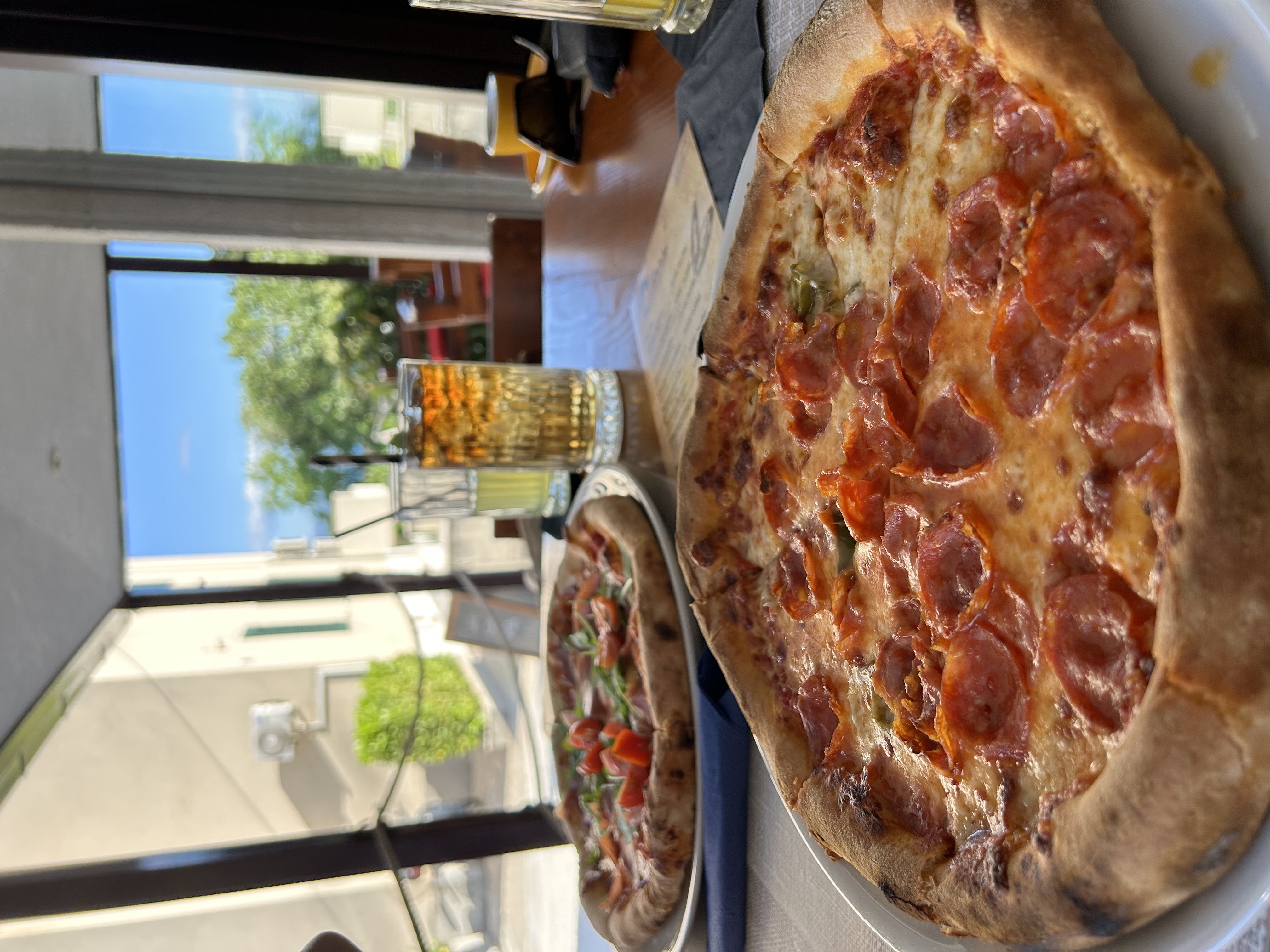 Fresh pizza and ingredients at Tudors in Split
