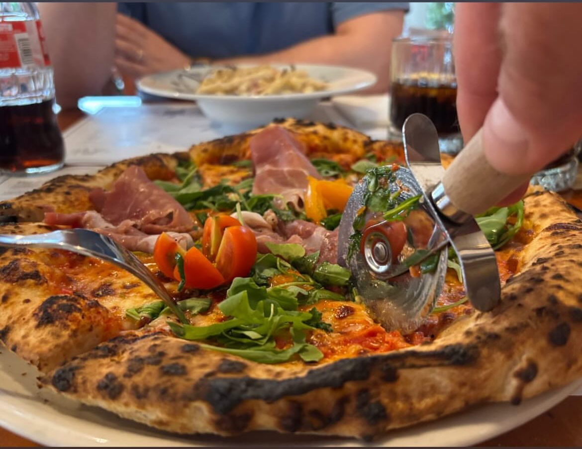 Pizza slice served at Tudors in Firule Split